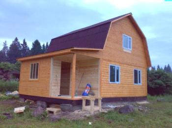 Как да построим къща от дървен материал